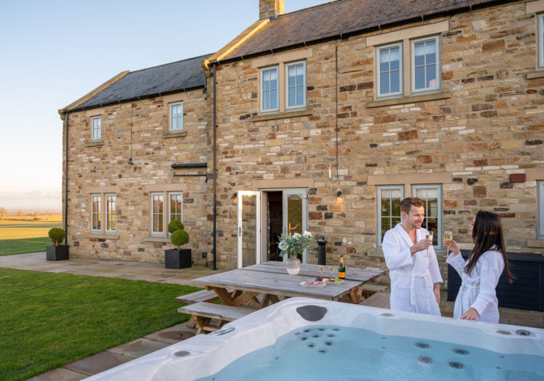 cottage with a hot tub