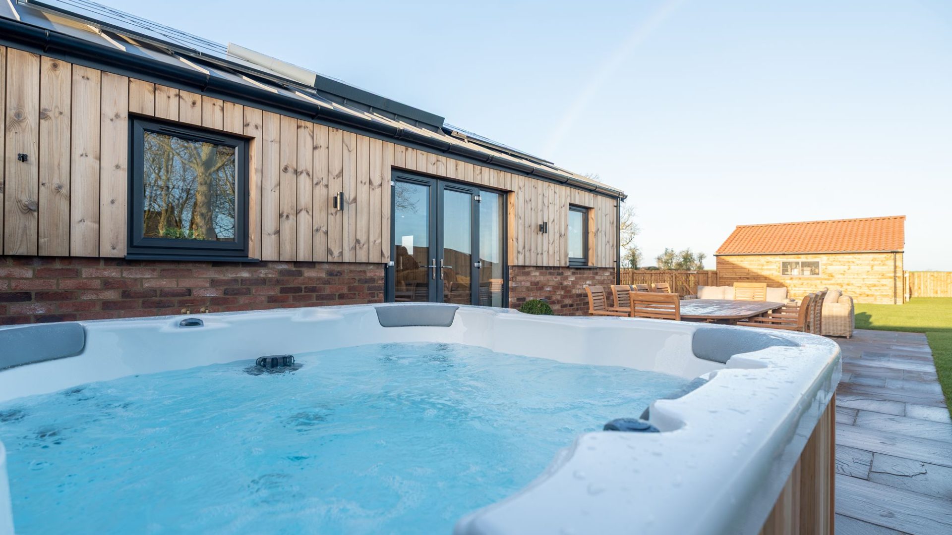 A beautifully designed 8 bedroom cottage with hot tubs and games rooms.