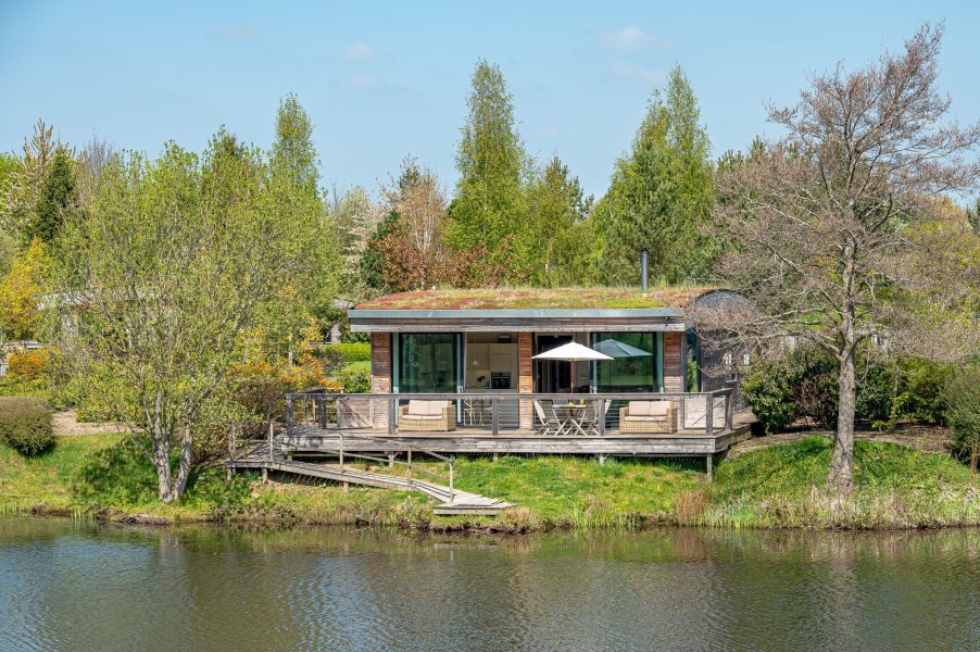 Exterior of Finley lodge at Brompton Lakes with private decking and panoramic lake views.