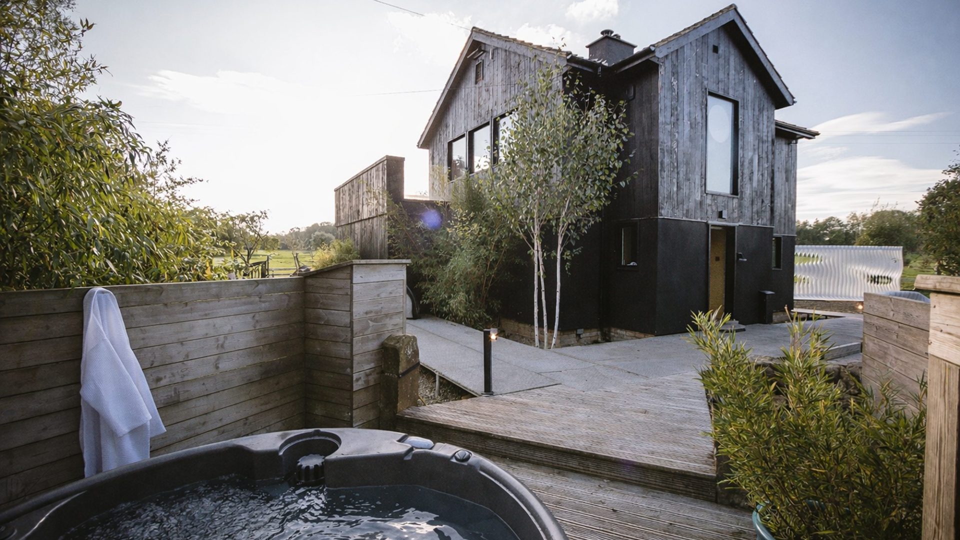 Exterior of New York Public Library with hot tub and decking area in North Yorkshire.