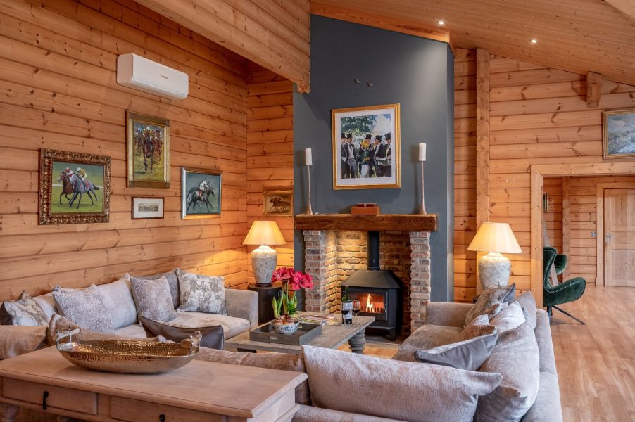 Spacious luxury dining area with log burner at Valley View.