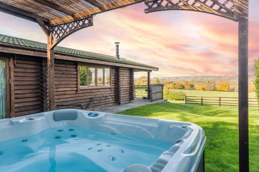 Covered hot tub in private garden at William lodge at Sun Hill Farm.