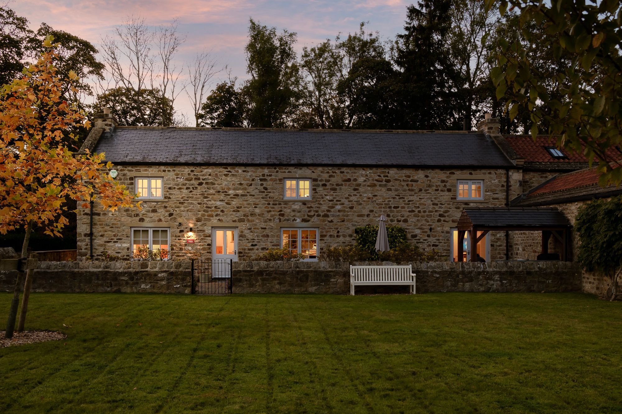 Exterior view of Holly House Farm, a trio of luxury cottages with hot tubs in North Yorkshire.