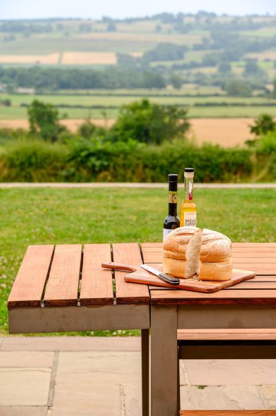 Countryside views from the outdoor dining area at Dexter holiday home. 