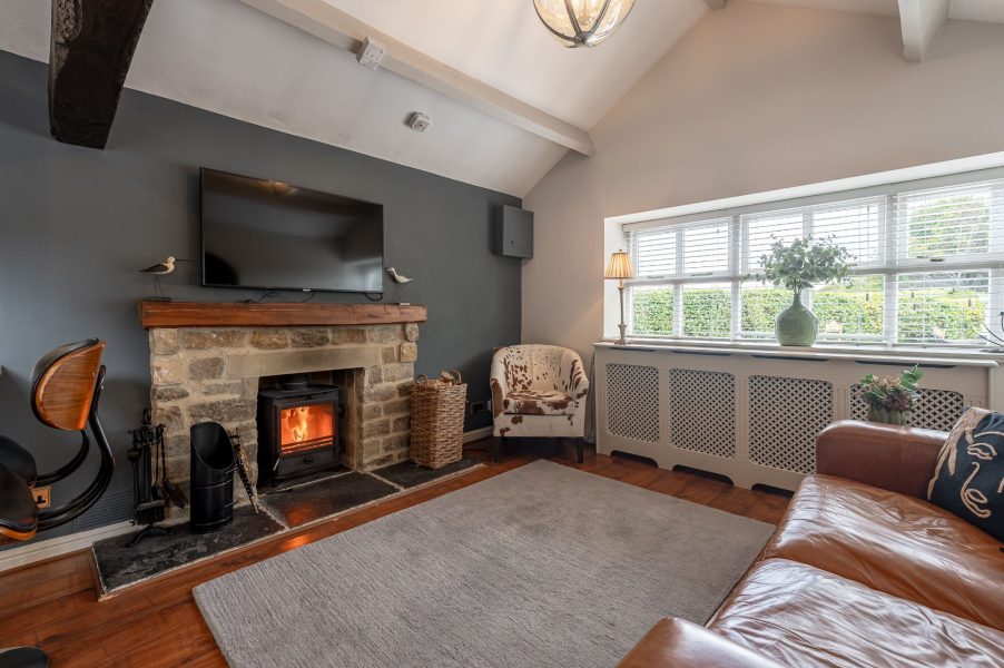 Cosy lounge with log burner in Sun Hill Palins near Leyburn, North Yorkshire.