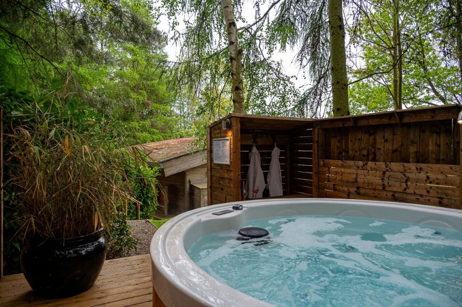 Private jacuzzi-style hot tub at Percy lodge at Brompton Lakes in Yorkshire.